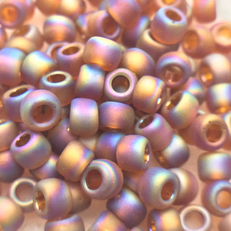 TOHO Topaz Smoky Transparent Rainbow, 6/0 Round, 8.5g, $2.13