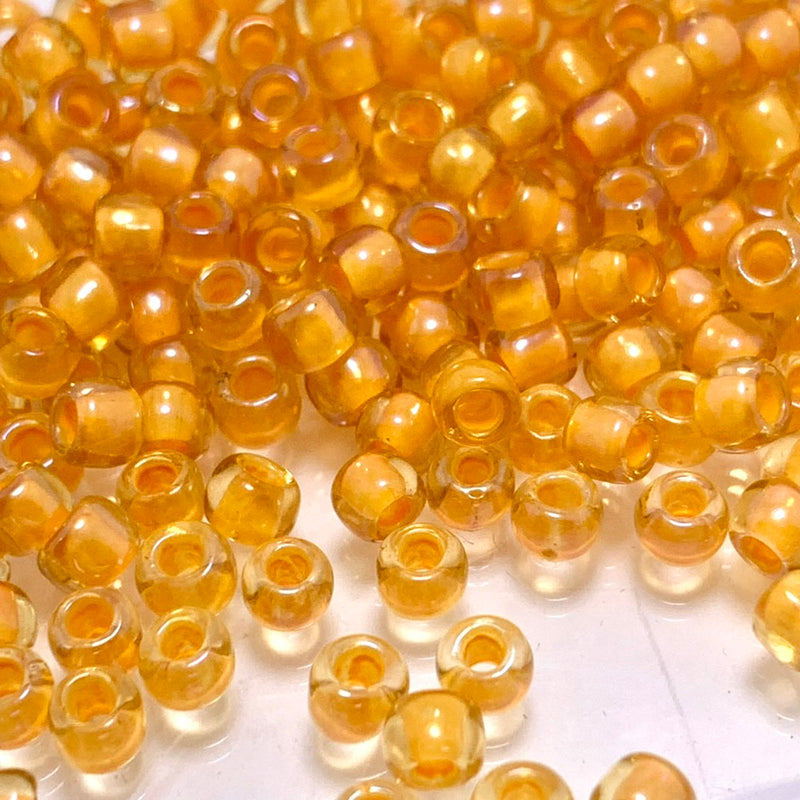 Jonquil Apricot Lined,  11/0 TOHO Round, 8.0 grams