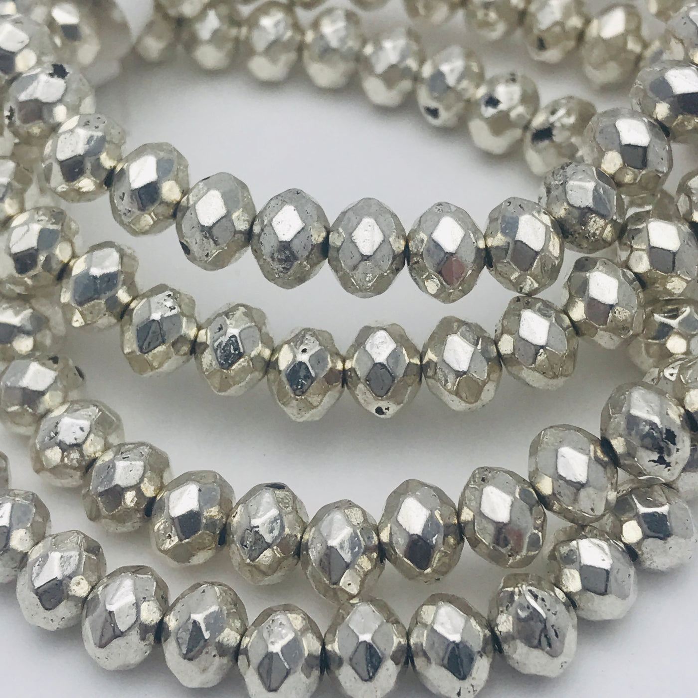Faceted store silver beads